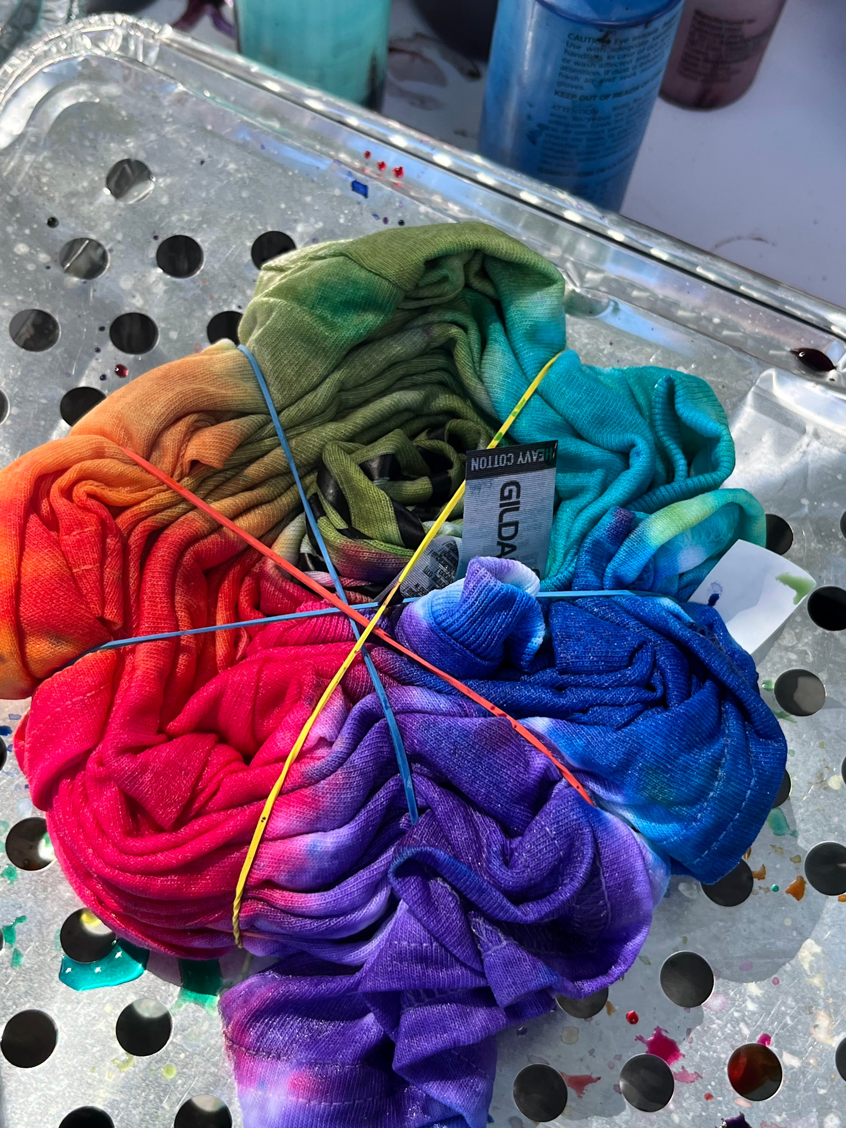 Rainbow tie-dye shirt bundled with rubber bands